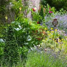 Load image into Gallery viewer, Rusty Poppy Seed Garden Sculpture
